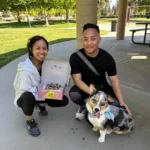 AJ Flores and wife with dog