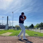Eleazar Aguirre pitching from the mound during a baseball game