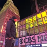 Eleazar Aguirre in Times Square, New York City, at night