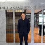 Eleazar Aguirre outside the Sid Craig School of Business at Fresno State